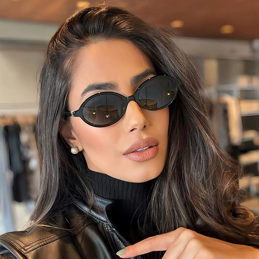 Retro-Sonnenbrille mit rundem Rahmen und goldenen Details