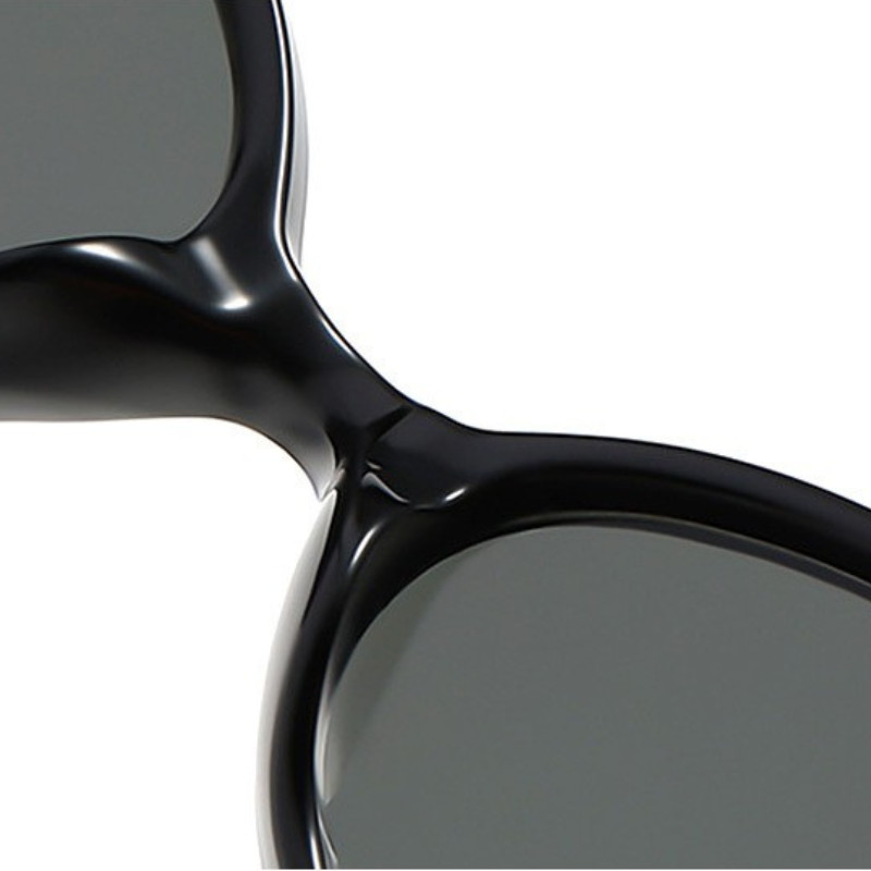 Retro-Sonnenbrille mit rundem Rahmen und goldenen Details