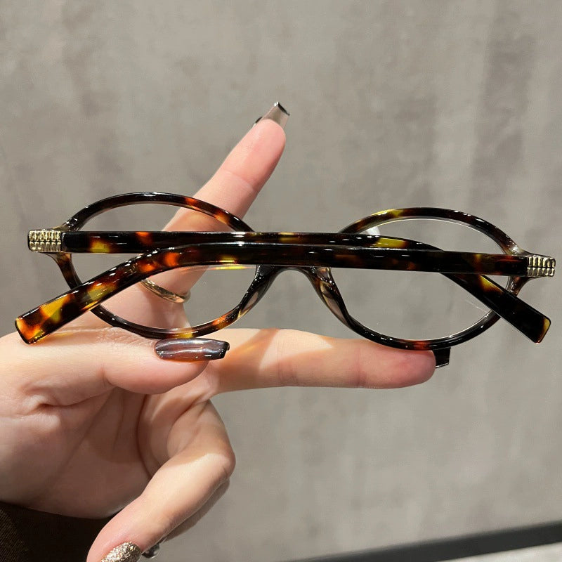 Ovale Retro-Brille mit Leopardenmuster