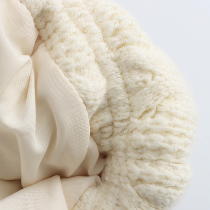 Gesteppte Strickjacke mit Zopfmuster – Kuschelig & Stilvoll