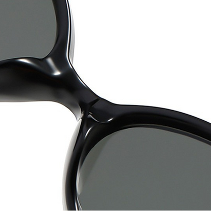 Retro-Sonnenbrille mit rundem Rahmen und goldenen Details