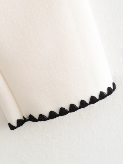 Eleganter Wollmantel mit integriertem Schal & Kontrastnähten